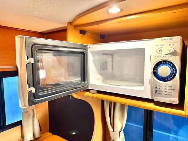 カムロード キャンピングワークス オルビス ユーロ ディーゼル レンタアップ車 タイベル交換済 家庭用エアコン FFヒータ- リアヒーター トリプルサブバッテリー サイドオーニング マルチルーム 電子レンジ(11枚目)