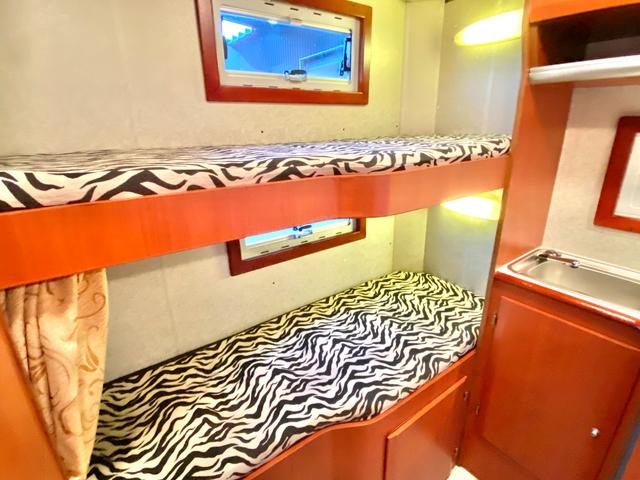 ハイエースワゴン 　ファンルーチェ　セレンゲティ　ツインサブバッテリー　ＦＦヒータ－　リアヒーター　リアクーラー　２０００Ｗインバーター　サイドオーニング　ルーフベント　テレビ　１２Ｖ冷蔵庫　外部充電　キッチン　コンロ（75枚目）