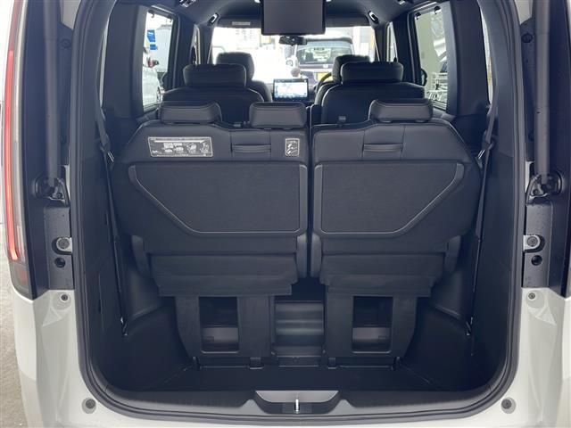 ステップワゴン ｅ：ＨＥＶスパーダ　・登録済未使用車・純正１１．４インチナビ（ＣＤ／ＤＶＤ／ＴＶ／ＢＴ／ＳＤ）・純正１５．６インチフリップダウンモニター・両側パワースライドドア・衝突軽減ブレーキ（ＣＭＢＳ）・先行車発進お知らせ（19枚目）