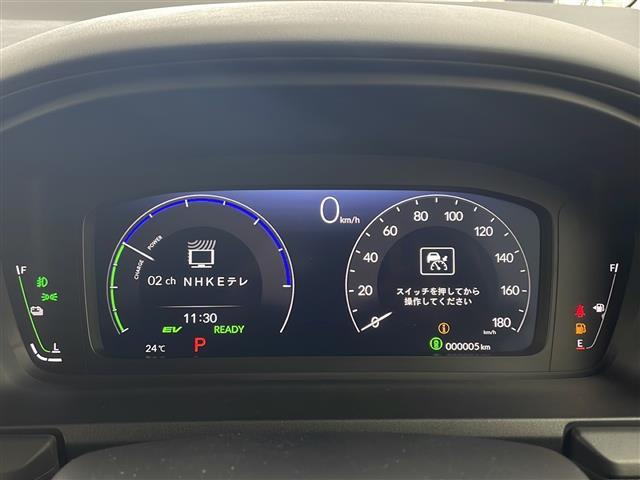 ステップワゴン ｅ：ＨＥＶスパーダ　・登録済未使用車・純正１１．４インチナビ（ＣＤ／ＤＶＤ／ＴＶ／ＢＴ／ＳＤ）・純正１５．６インチフリップダウンモニター・両側パワースライドドア・衝突軽減ブレーキ（ＣＭＢＳ）・先行車発進お知らせ（25枚目）