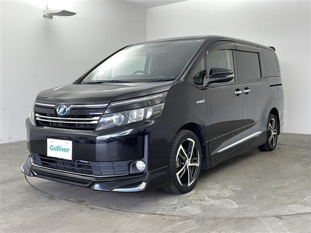 ヴォクシー ハイブリッドV ・寒冷地仕様・社外ナビ・社外フリップダウンモニター・フルセグ・両側パワースライドドア・社外前ドライブレコーダー・置くだけ充電・バックカメラ・LEDライト・ETC・DVD・社外エアロ・クルコン・フォグ(2枚目)