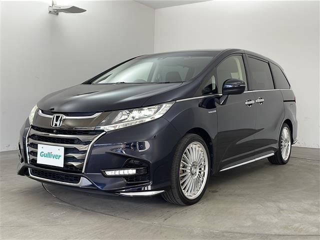 オデッセイハイブリッド ハイブリッドアブソルート・ＥＸホンダセンシング　純正インターナビ　純正フリップダウン　全方位カメラ　両側電動スライド　ＢＳＭ　衝突軽減　レーダークルーズコントロール　ハーフレザー　レーンキープ　社外１９インチＡＷ　ＬＥＤライト　ＥＴＣ　ＴＶ　ＢＴ（2枚目）