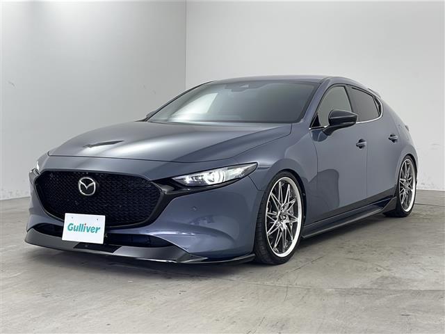 ＭＡＺＤＡ３ファストバック Ｘプロアクティブ　ツーリングセレクション　純正ナビ・全方位カメラ・ビルトインＥＴＣ・ＢＬＩＺ車高調・社外マフラー・ＷＯＲＫシュパート１９インチアルミホイール・純正アンダーエアロ・ｉ－ＡＣＴＩＶＥＳＥＮＳＥ・ドライバーモニタリング（2枚目）