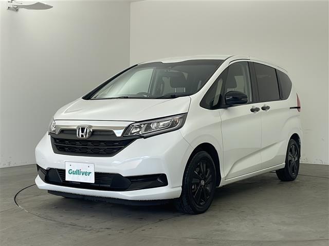 フリードハイブリッド ハイブリッド・Gブラックスタイル 純正ナビ TV バックカメラ ビルトインETC 両側パワースライドドア 衝突被害軽減ブレーキ レーダークルーズコントロール レーンキープアシスト シートヒーター 純正15インチアルミホイール LED(2枚目)