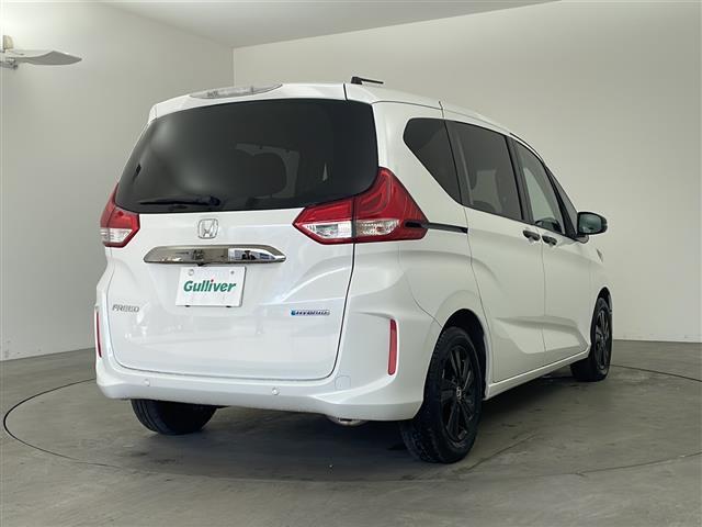 フリードハイブリッド ハイブリッド・Gブラックスタイル 純正ナビ TV バックカメラ ビルトインETC 両側パワースライドドア 衝突被害軽減ブレーキ レーダークルーズコントロール レーンキープアシスト シートヒーター 純正15インチアルミホイール LED(3枚目)