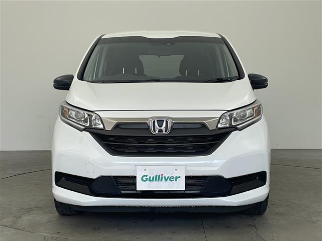 フリードハイブリッド ハイブリッド・Gブラックスタイル 純正ナビ TV バックカメラ ビルトインETC 両側パワースライドドア 衝突被害軽減ブレーキ レーダークルーズコントロール レーンキープアシスト シートヒーター 純正15インチアルミホイール LED(4枚目)