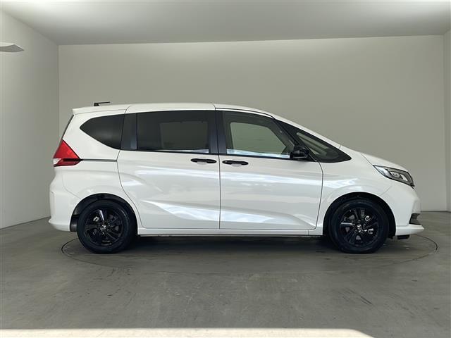 フリードハイブリッド ハイブリッド・Gブラックスタイル 純正ナビ TV バックカメラ ビルトインETC 両側パワースライドドア 衝突被害軽減ブレーキ レーダークルーズコントロール レーンキープアシスト シートヒーター 純正15インチアルミホイール LED(6枚目)