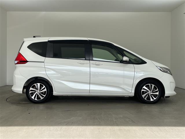 フリード+ハイブリッド ハイブリッドEX ・純正7インチナビ・BT・CD・DVD・SD・USB・TV・バックカメラ・両側パワースライドドア・ステアリングスイッチ・ハーフレザーシート・前席シートヒーター・純正前方ドライブレコーダー・ETC(6枚目)