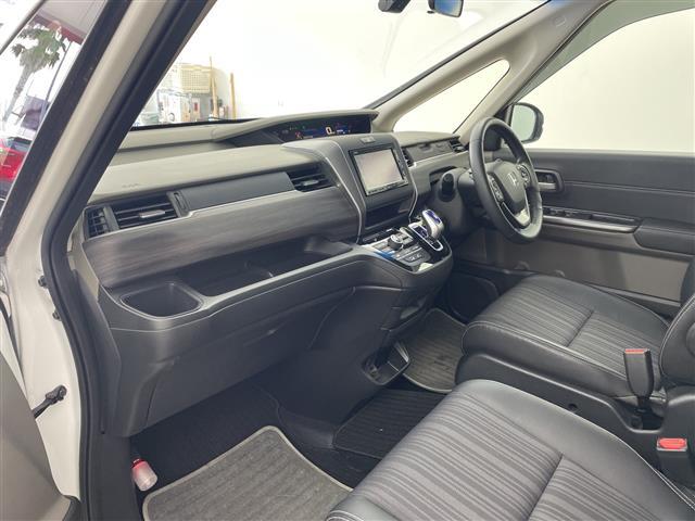 フリード+ハイブリッド ハイブリッドEX ・純正7インチナビ・BT・CD・DVD・SD・USB・TV・バックカメラ・両側パワースライドドア・ステアリングスイッチ・ハーフレザーシート・前席シートヒーター・純正前方ドライブレコーダー・ETC(12枚目)