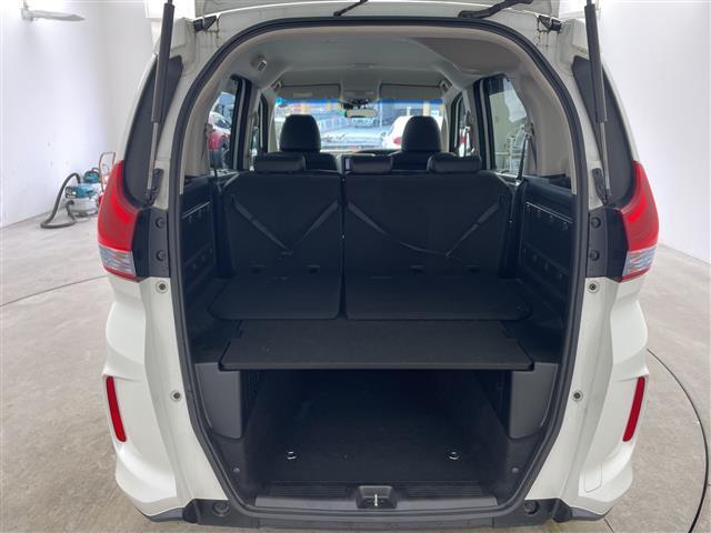 フリード+ハイブリッド ハイブリッドEX ・純正7インチナビ・BT・CD・DVD・SD・USB・TV・バックカメラ・両側パワースライドドア・ステアリングスイッチ・ハーフレザーシート・前席シートヒーター・純正前方ドライブレコーダー・ETC(16枚目)