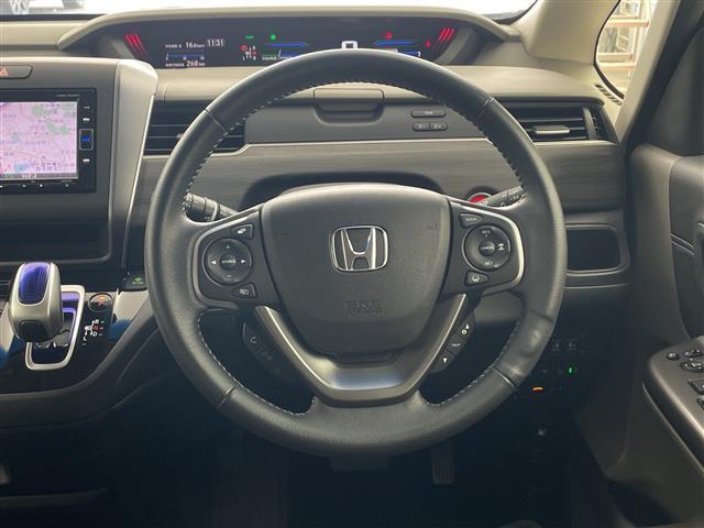 フリード+ハイブリッド ハイブリッドEX ・純正7インチナビ・BT・CD・DVD・SD・USB・TV・バックカメラ・両側パワースライドドア・ステアリングスイッチ・ハーフレザーシート・前席シートヒーター・純正前方ドライブレコーダー・ETC(20枚目)