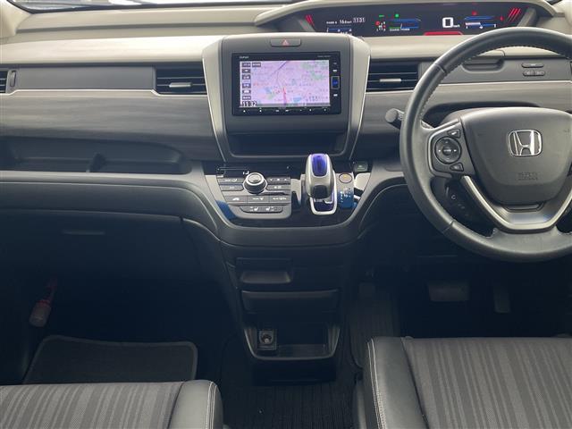 フリード+ハイブリッド ハイブリッドEX ・純正7インチナビ・BT・CD・DVD・SD・USB・TV・バックカメラ・両側パワースライドドア・ステアリングスイッチ・ハーフレザーシート・前席シートヒーター・純正前方ドライブレコーダー・ETC(23枚目)