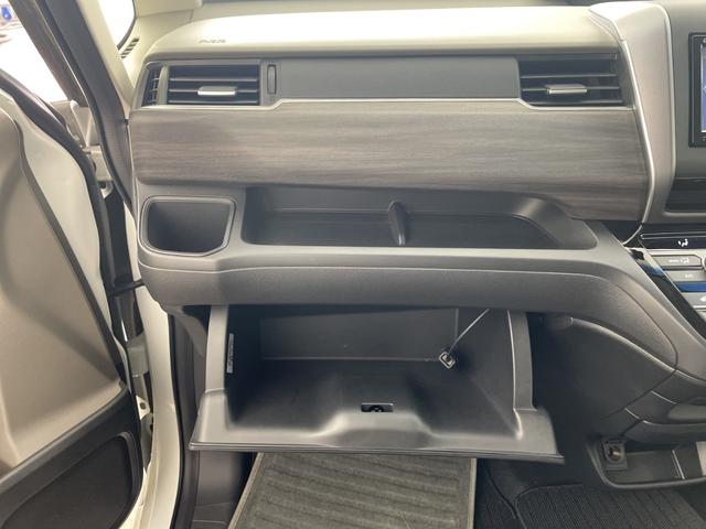 フリード+ハイブリッド ハイブリッドEX ・純正7インチナビ・BT・CD・DVD・SD・USB・TV・バックカメラ・両側パワースライドドア・ステアリングスイッチ・ハーフレザーシート・前席シートヒーター・純正前方ドライブレコーダー・ETC(71枚目)