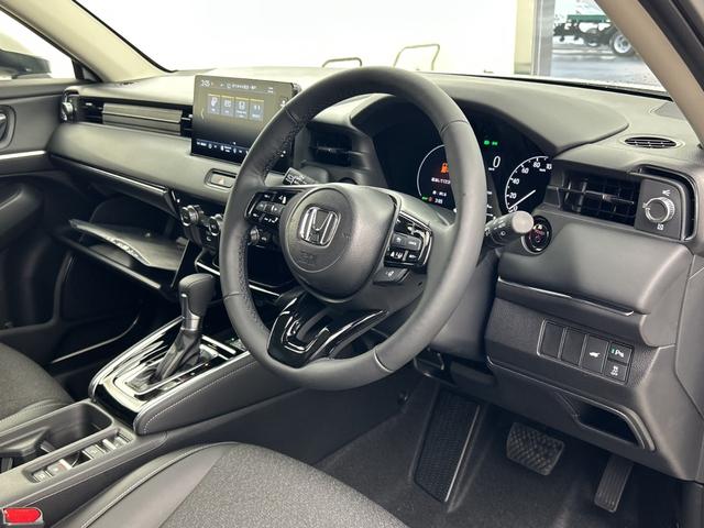 ヴェゼル ｅ：ＨＥＶ　Ｚ　未使用車　純正ナビ　バックカメラ　ホンダセンシング　クリアランスソナー　パワーバックドア　ワイヤレス充電器　ハーフレザーシート　シートヒーター　ＬＥＤライト　ＬＥＤフォグランプ　スペアキー　ＥＴＣ（9枚目）