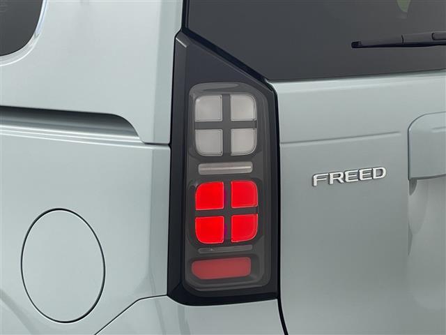 フリード ｅ：ＨＥＶエアー　ＥＸ　登録済未使用車　９型ナビ　ＴＶ　バックカメラ　衝突軽減ブレーキ　レーンキープアシストシステム　ブラインドスポットモニタ　両側パワースライドドア　ハーフレザー　シートヒーター　ＬＥＤ　オートハイビーム（38枚目）