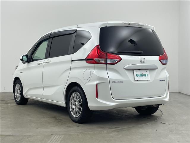 フリードハイブリッド ハイブリッド・ＥＸ　社外ナビ・バックカメラ・ビルトインＥＴＣ・衝突軽減ブレーキ・レーンキープアシスト・レーダークルーズコントロール・ハーフレザーシート・前席シートヒーター・ドアミラーヒーター・フロントワイパーデアイサー（3枚目）