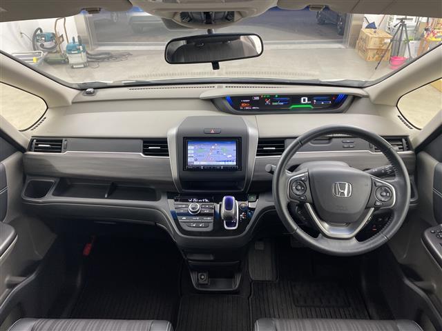 フリードハイブリッド ハイブリッド・ＥＸ　社外ナビ・バックカメラ・ビルトインＥＴＣ・衝突軽減ブレーキ・レーンキープアシスト・レーダークルーズコントロール・ハーフレザーシート・前席シートヒーター・ドアミラーヒーター・フロントワイパーデアイサー（21枚目）