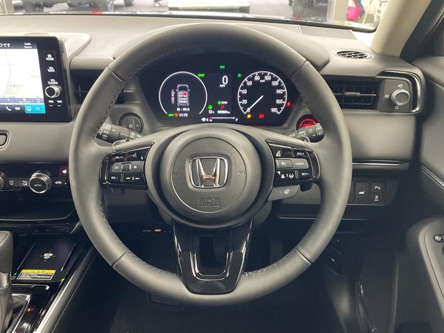 ヴェゼル ｅ：ＨＥＶ　Ｚ　・登録済未使用車・ホンダセンシング・衝突軽減ブレーキ・路外逸脱抑制機能・ＢＳＭ・アダプティブクルーズコントロール・踏み間違い防止・後退出庫サポート・純正ナビ・ＵＳＢ・置くだけ充電・ＥＴＣ・バックカメラ（20枚目）