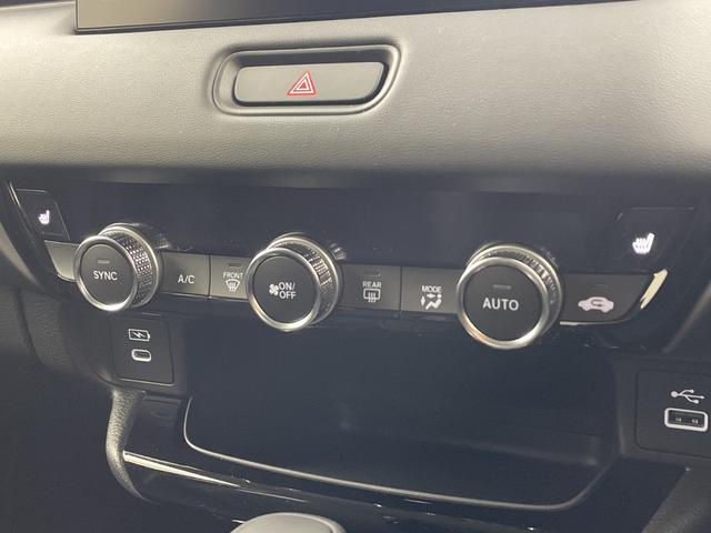 ヴェゼル ｅ：ＨＥＶ　Ｚ　・登録済未使用車・ホンダセンシング・衝突軽減ブレーキ・路外逸脱抑制機能・ＢＳＭ・アダプティブクルーズコントロール・踏み間違い防止・後退出庫サポート・純正ナビ・ＵＳＢ・置くだけ充電・ＥＴＣ・バックカメラ（31枚目）