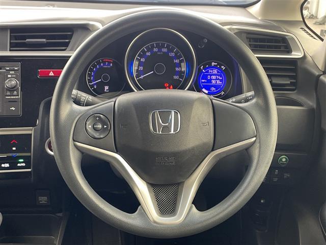 フィット １３Ｇ・Ｆパッケージ　コンフォートエディション　・純正ディスプレイオーディオ（ＣＤ／ＵＳＢ／ＴＶ）・衝突軽減ブレーキ・バックカメラ・シートヒーター・ＥＴＣ・ヘッドライトレベライザー・ＥＣＯＮ・プッシュスタート・スマートキー（21枚目）