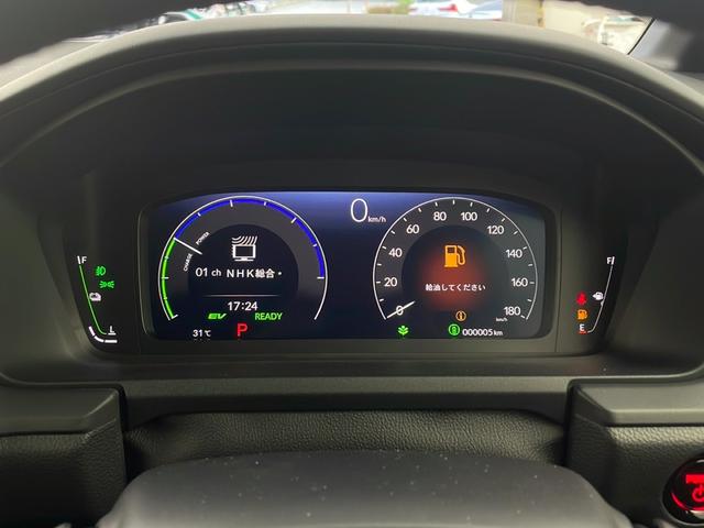 ステップワゴン ｅ：ＨＥＶスパーダ　登録未使用車　ホンダセンシング　衝突軽減ブレーキ　先行車発進告知　路外逸脱抑制機能　車線維持支援システム　ＢＳＭ　標識認識機能　リアパーキングセンサー　純正１１インチナビ　フルセグ　ＢＴ（11枚目）