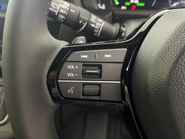 ステップワゴン ｅ：ＨＥＶスパーダ　登録未使用車　ホンダセンシング　衝突軽減ブレーキ　先行車発進告知　路外逸脱抑制機能　車線維持支援システム　ＢＳＭ　標識認識機能　リアパーキングセンサー　純正１１インチナビ　フルセグ　ＢＴ（12枚目）
