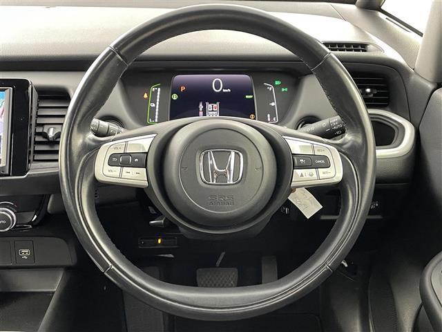 フィット ｅ：ＨＥＶホーム　ホンダセンシング　衝突軽減ブレーキ　誤発進抑制機能　後方誤発進抑制機能　近距離衝突軽減ブレーキ路外路外逸脱抑制機能　クルーズコントロール　純正ナビ　Ｂｌｕｅｔｏｏｔｈ　ＴＶ　前後ドライブレコーダー（25枚目）