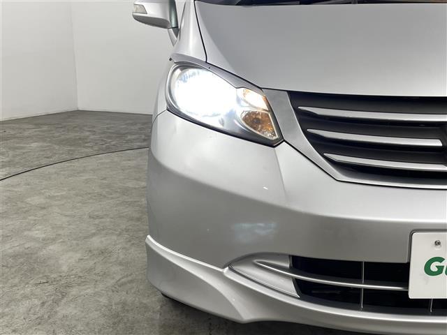 フリード フレックス　エアロ　純正ナビゲーション　フルセグＴＶ　バックカメラ　ＥＴＣ　ステアリングスイッチ　片側パワースライドドア　２列目左福祉仕様シート　リモコンキー　ＨＩＤライト　オートライト　純正フロアマット　ドアバイザー（11枚目）