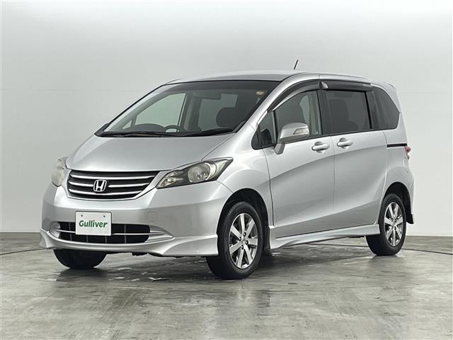 フリード フレックス　エアロ　純正ナビゲーション　フルセグＴＶ　バックカメラ　ＥＴＣ　ステアリングスイッチ　片側パワースライドドア　２列目左福祉仕様シート　リモコンキー　ＨＩＤライト　オートライト　純正フロアマット　ドアバイザー（13枚目）