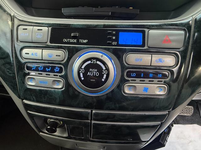 ヴォクシー Ｚ　エアコン　フルフラットシート　ＡＢＳ　キーレス　パワステ　３列シート　ＥＴＣ　ウォークスルー　パワーウィンドー　衝突安全ボディ　運転席エアバッグ　電格ミラー　Ｂカメラ　ＴＶ・ナビ　Ｗエアコン（22枚目）