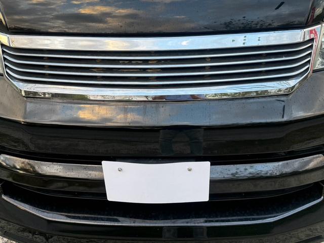 ヴォクシー Ｚ　エアコン　フルフラットシート　ＡＢＳ　キーレス　パワステ　３列シート　ＥＴＣ　ウォークスルー　パワーウィンドー　衝突安全ボディ　運転席エアバッグ　電格ミラー　Ｂカメラ　ＴＶ・ナビ　Ｗエアコン（53枚目）