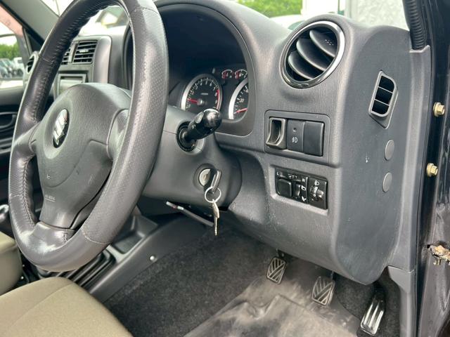 ジムニー ワイルドウインド　ＭＴ　４ＷＤ　ＥＴＣ　キーレスエントリー　電動格納ミラー　　ルーフレール　アルミホイール　衝突安全ボディ　エアコン　パワーウィンドウ　運転席エアバッグ（18枚目）