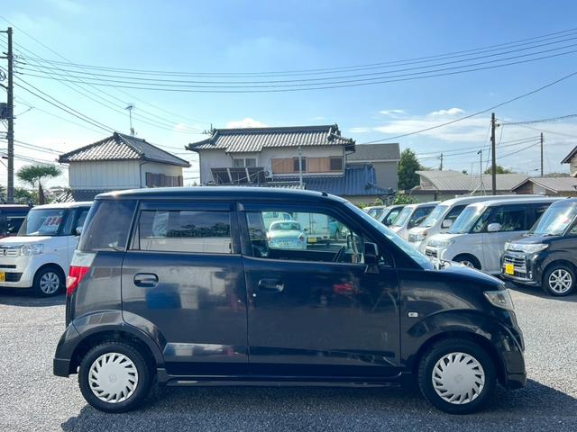 ゼスト スポーツＧ　キーレスエントリー　ベンチシート　ＡＴ　盗難防止システム　ＡＢＳ　衝突安全ボディ　エアコン　パワーステアリング　パワーウィンドウ（13枚目）