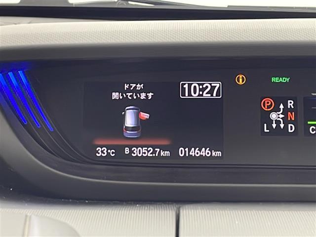 フリードハイブリッド ハイブリッド・クロスター　純正８型ナビ　フルセグＴＶ　プッシュスタート　スマートキー　レーダークルーズコントロール　ＥＴＣ　バックカメラ　純正フロアマット　シートヒーター　両側パワースライドドア　純正アルミホイール　禁煙車（9枚目）