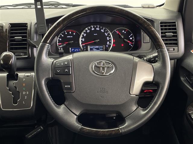 ハイエースバン スーパーGL ダークプライム 社外ナビ フルセグ Bluetooth バックカメラ ハーフレザー 社外アルミホイール ホワイトレタータイヤ ステアリングリモコン オートライト リアガラスフィルム ETC フロアマット ドアバイザー(5枚目)