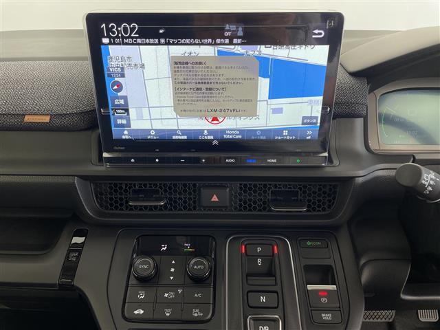ステップワゴン ｅ：ＨＥＶエアー　ＥＸ　登録済未使用車　ホンダセンシング　純正１１．４型ナビ　パドルシフト　アダプティブクルーズコントロール　電動リアゲート　バックカメラ　両側パワースライドドア　オットマン　オートハイビーム　オートホールド（5枚目）