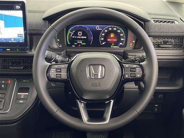 ステップワゴン ｅ：ＨＥＶエアー　ＥＸ　登録済未使用車　ホンダセンシング　純正１１．４型ナビ　パドルシフト　アダプティブクルーズコントロール　電動リアゲート　バックカメラ　両側パワースライドドア　オットマン　オートハイビーム　オートホールド（6枚目）