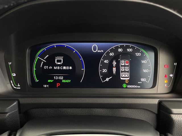 ステップワゴン ｅ：ＨＥＶエアー　ＥＸ　登録済未使用車　ホンダセンシング　純正１１．４型ナビ　パドルシフト　アダプティブクルーズコントロール　電動リアゲート　バックカメラ　両側パワースライドドア　オットマン　オートハイビーム　オートホールド（11枚目）