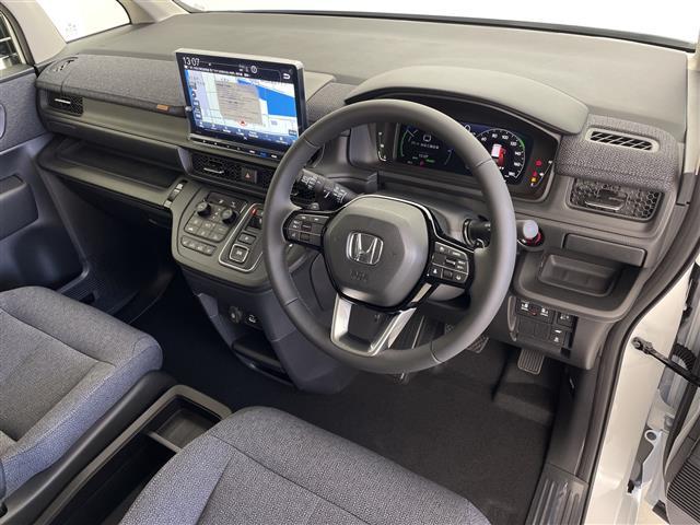 ステップワゴン ｅ：ＨＥＶエアー　ＥＸ　登録済未使用車　ホンダセンシング　純正１１．４型ナビ　パドルシフト　アダプティブクルーズコントロール　電動リアゲート　バックカメラ　両側パワースライドドア　オットマン　オートハイビーム　オートホールド（28枚目）