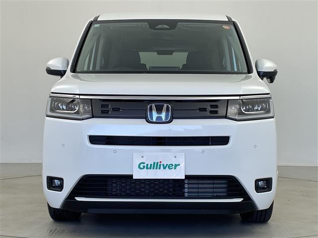 ステップワゴン ｅ：ＨＥＶエアー　ＥＸ　登録済未使用車　ホンダセンシング　純正１１．４型ナビ　パドルシフト　アダプティブクルーズコントロール　電動リアゲート　バックカメラ　両側パワースライドドア　オットマン　オートハイビーム　オートホールド（33枚目）