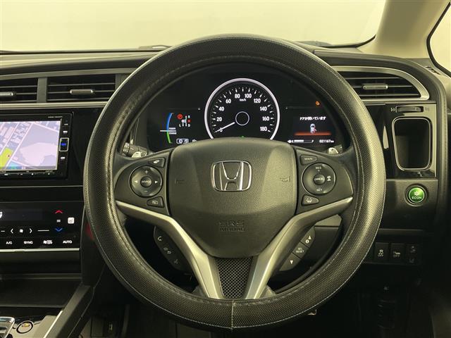 シャトル ハイブリッド　ホンダセンシング　純正ＳＤナビ　レーダークルーズコントロール　レーンキープアシスト　パドルシフト　前席シートヒーター　ドライブレコーダー　ドアバイザー　ＬＥＤヘッドライト　ビルドインＥＴＣ　電格ミラー（6枚目）