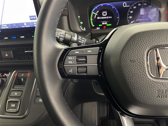 ステップワゴン ｅ：ＨＥＶスパーダ　プレミアムライン　純正１１インチナビ　純正フリップ　マルチビューカメラ　パワーバックドア　パドルシフト　レーダークルコン　両側パワスラ　ＢＳＭ　ハーフレザーシート　オットマン　オートライト　ＭＵＧＥＮフロントグリル（8枚目）