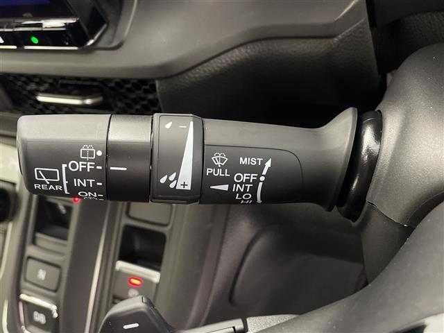 ステップワゴン ｅ：ＨＥＶスパーダ　プレミアムライン　純正１１インチナビ　純正フリップ　マルチビューカメラ　パワーバックドア　パドルシフト　レーダークルコン　両側パワスラ　ＢＳＭ　ハーフレザーシート　オットマン　オートライト　ＭＵＧＥＮフロントグリル（10枚目）