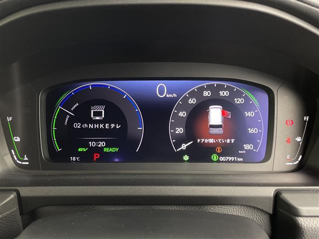 ステップワゴン ｅ：ＨＥＶスパーダ　プレミアムライン　純正１１インチナビ　純正フリップ　マルチビューカメラ　パワーバックドア　パドルシフト　レーダークルコン　両側パワスラ　ＢＳＭ　ハーフレザーシート　オットマン　オートライト　ＭＵＧＥＮフロントグリル（12枚目）