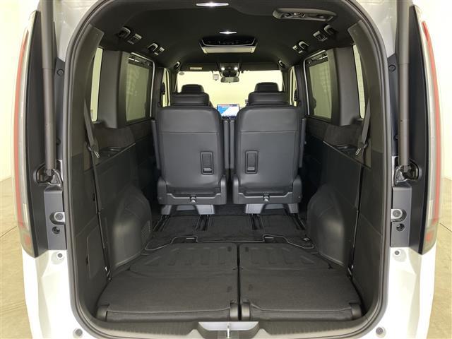 ステップワゴン ｅ：ＨＥＶスパーダ　プレミアムライン　純正１１インチナビ　純正フリップ　マルチビューカメラ　パワーバックドア　パドルシフト　レーダークルコン　両側パワスラ　ＢＳＭ　ハーフレザーシート　オットマン　オートライト　ＭＵＧＥＮフロントグリル（25枚目）