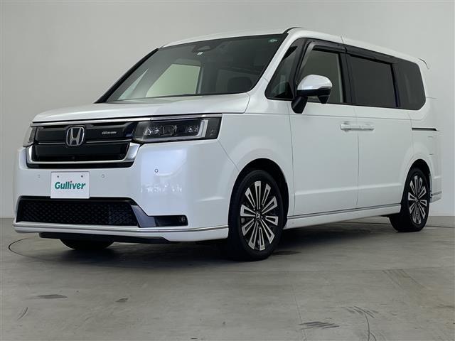 ステップワゴン ｅ：ＨＥＶスパーダ　プレミアムライン　純正１１インチナビ　純正フリップ　マルチビューカメラ　パワーバックドア　パドルシフト　レーダークルコン　両側パワスラ　ＢＳＭ　ハーフレザーシート　オットマン　オートライト　ＭＵＧＥＮフロントグリル（31枚目）