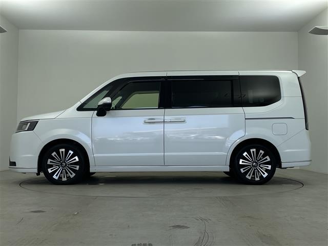 ステップワゴン ｅ：ＨＥＶスパーダ　プレミアムライン　純正１１インチナビ　純正フリップ　マルチビューカメラ　パワーバックドア　パドルシフト　レーダークルコン　両側パワスラ　ＢＳＭ　ハーフレザーシート　オットマン　オートライト　ＭＵＧＥＮフロントグリル（35枚目）