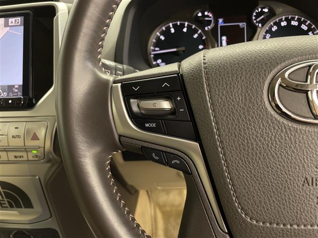 ランドクルーザープラド ＴＸ　社外ＳＤナビ　ＡＬＰＩＮＥスピーカー　バックカメラ　パーキングセンサー　社外フロアマット　リフトアップ　ＥＴＣ　ＬＤＡ　ＰＣＳ　ＡＣＣ　ＬＥＤヘッドライト　社外ＡＷ　ホワイトレタータイヤ（6枚目）