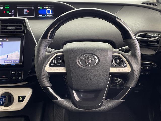 プリウス Ｓセーフティプラス　モデリスタエアロ　ＴＥＩＮ車高調　純正ナビ　ＨＤＭＩ　バックカメラ　ヘッドアップディスプレイ　クリアランスソナー　電動格納ミラー　ＥＴＣ　オートマチックハイビーム　ステアリングリモコン　シートカバー（6枚目）