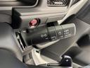 ｅ：ＨＥＶエアー　ＥＸ　登録済未使用車　ホンダセンシング　純正１１．４型ナビ　パドルシフト　アダプティブクルーズコントロール　電動リアゲート　バックカメラ　両側パワースライドドア　オットマン　オートハイビーム　オートホールド（10枚目）